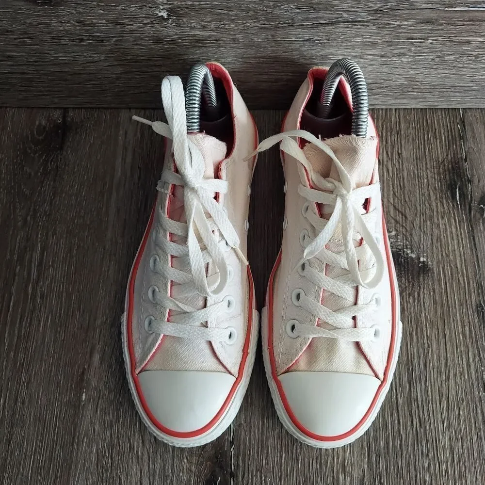 Converse sneakers off